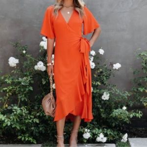 Vici Santos Ruffle Wrap Midi Dress in Rust